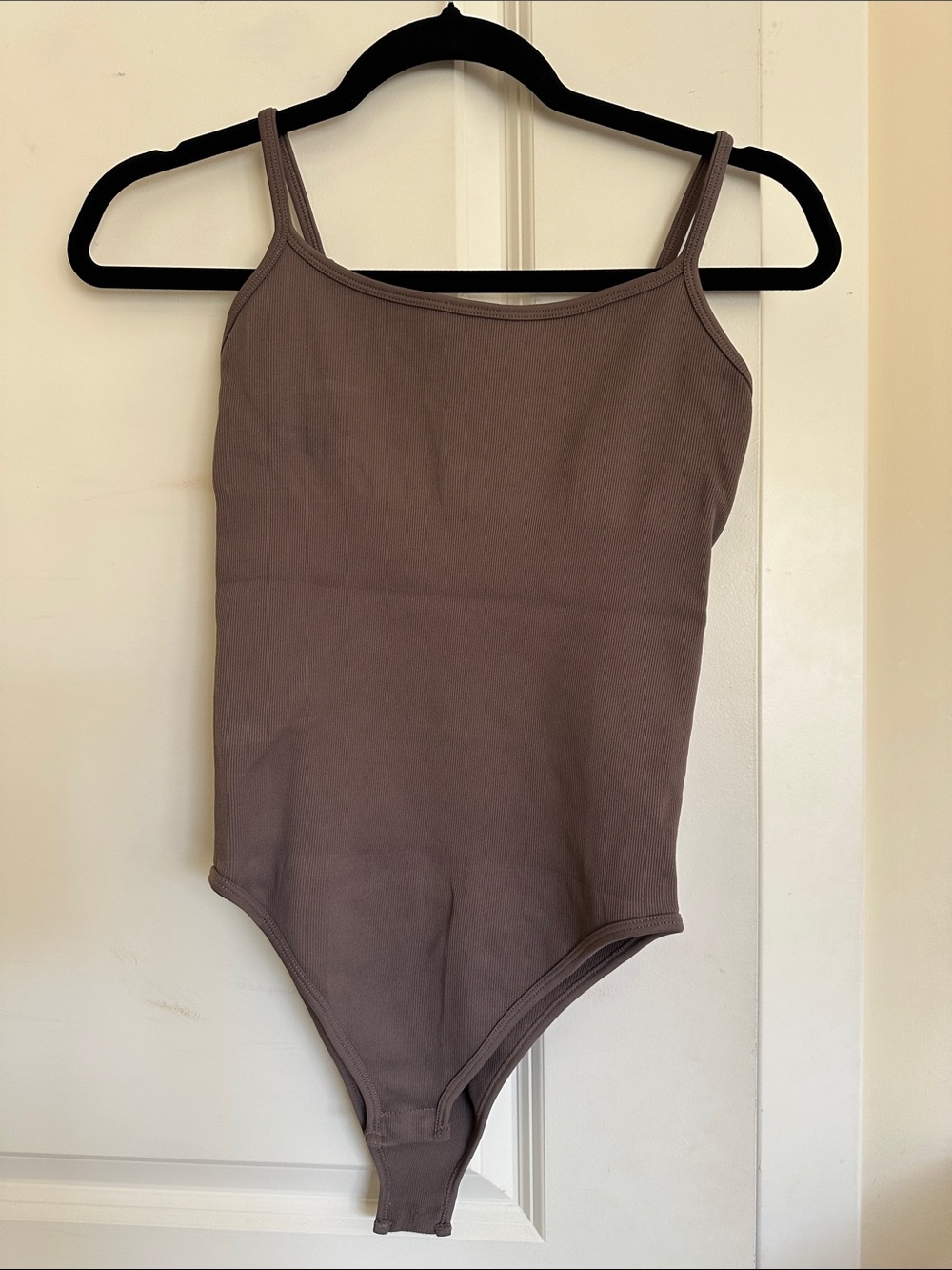 Sleeveless One-Piece Bodysuit in Taupe
